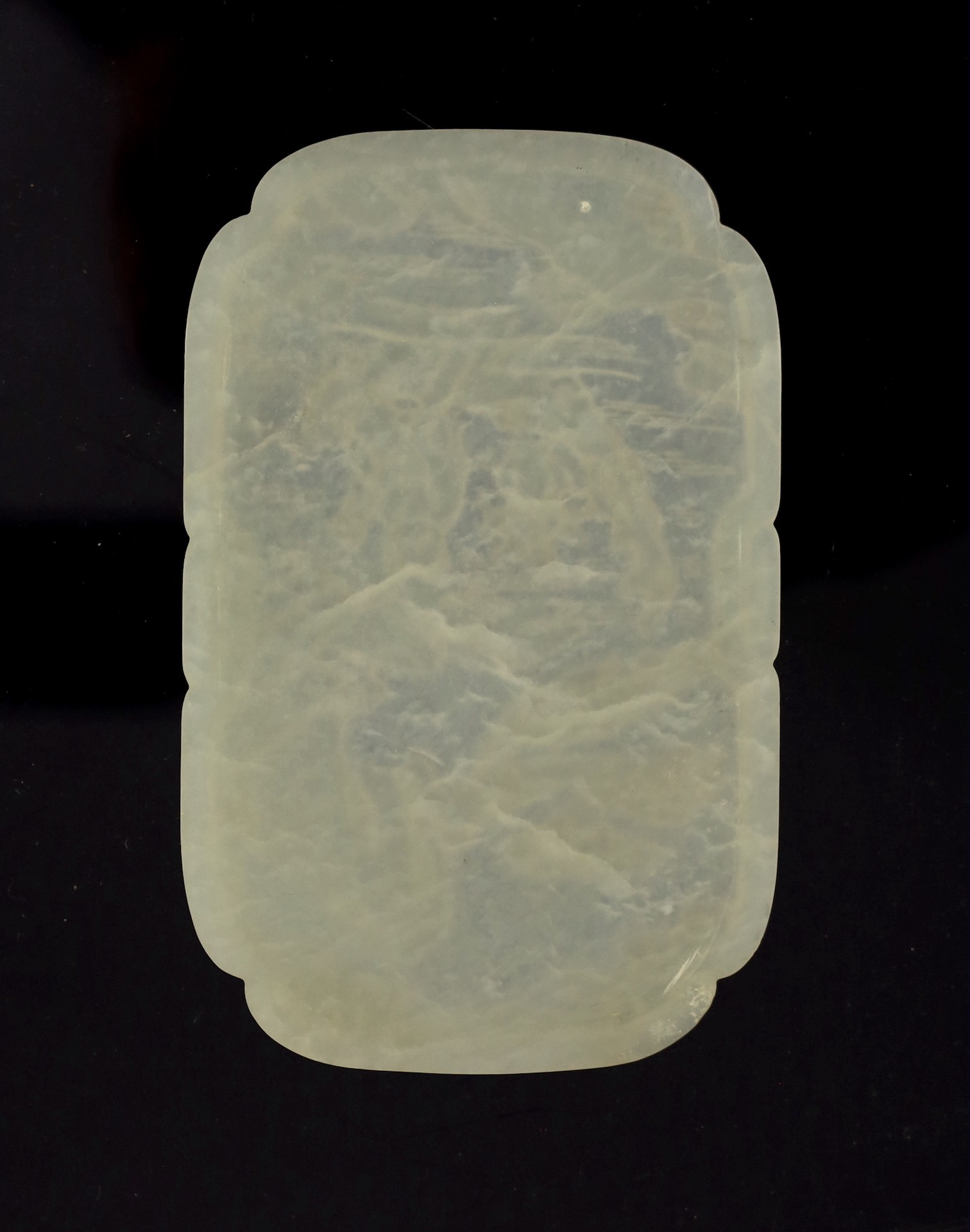 A Chinese white jade ‘He Xiangu’ shaped rectangular plaque, 18th/19th century